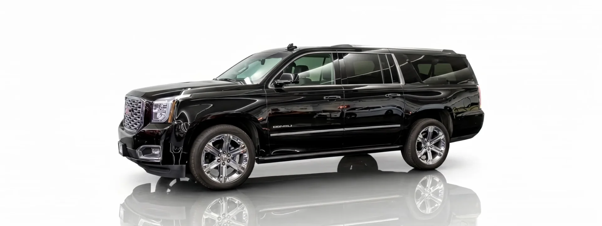 Black GMC Yukon XL Denali, the GrandArrival signature vehicle