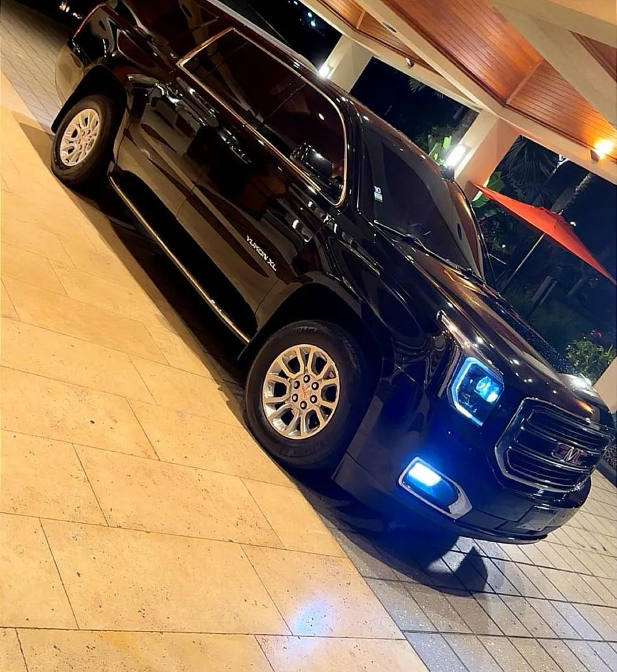 Black GMC Yukon XL Denali, the GrandArrival signature vehicle